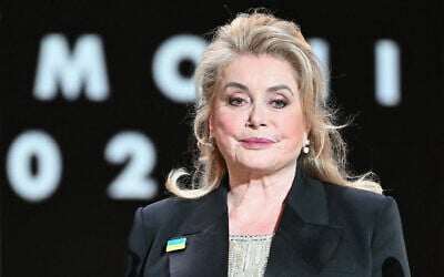 French actress Catherine Deneuve looks on during the 50th edition of the Cesar Film Awards ceremony at the Olympia venue in Paris, France, February 28, 2025. (Bertrand Guay / AFP)