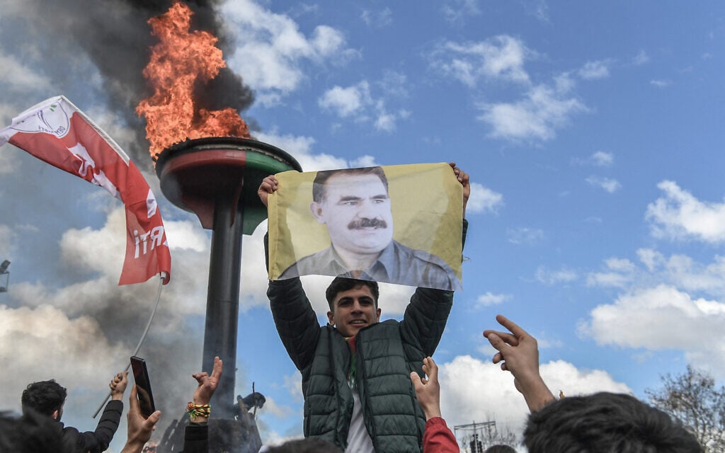 Kurdish PKK group will disband and disarm as part of peace initiative with Turkey