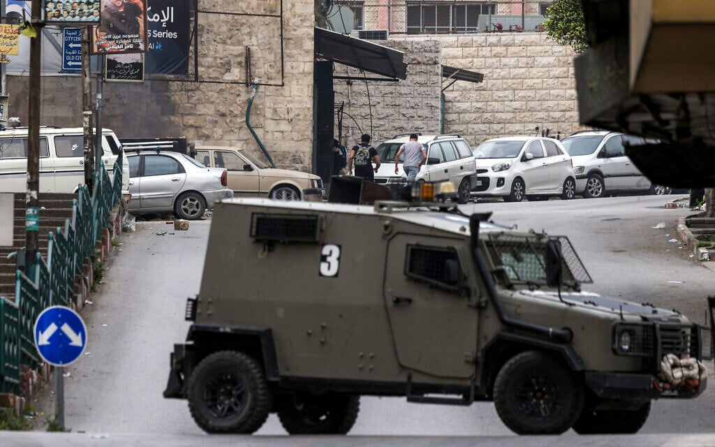 Two reservists wounded, one seriously, in West Bank roadside bomb attack