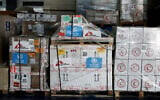 Humanitarian supplies earmarked for Gaza are stored at Egyptian Red Crescent warehouses in the Egyptian border town of El-Arish during an Israeli blockade on aid deliveries to Gaza, on April 8, 2025. (Benoit Tessier /POOL/AFP)