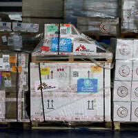 Humanitarian supplies earmarked for Gaza are stored at Egyptian Red Crescent warehouses in the Egyptian border town of El-Arish during an Israeli blockade on aid deliveries to Gaza, on April 8, 2025. (Benoit Tessier /POOL/AFP)