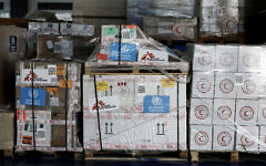 Humanitarian supplies earmarked for Gaza are stored at Egyptian Red Crescent warehouses in the Egyptian border town of El-Arish during an Israeli blockade on aid deliveries to Gaza, on April 8, 2025. (Benoit Tessier /POOL/AFP)