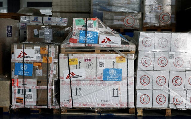 Humanitarian supplies earmarked for Gaza are stored at Egyptian Red Crescent warehouses in the Egyptian border town of El-Arish during an Israeli blockade on aid deliveries to Gaza, on April 8, 2025. (Benoit Tessier /POOL/AFP)