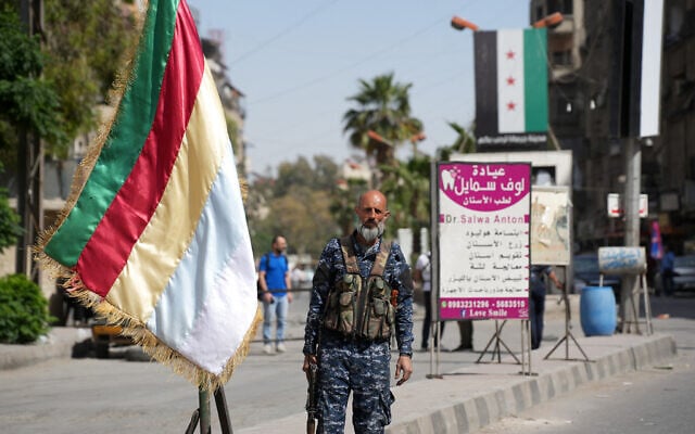 A member of the Druze security forces stands guard in Jaramana in the suburb of Damascus on April 29, 2025, following overnight sectarian clashes. (Rami al SAYED / AFP) A member of the Druze security forces stands guard in Jaramana in the suburb of Damascus on April 29, 2025, following overnight sectarian clashes. (Rami al SAYED / AFP)