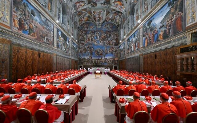 Cardinals before the start of the conclave to elect a new Pope in the Sistine chapel in The Vatican, May 7, 2025. (Simone Risoluti / VATICAN MEDIA / AFP) Cardinals before the start of the conclave to elect a new Pope in the Sistine chapel in The Vatican, May 7, 2025. (Simone Risoluti / VATICAN MEDIA / AFP)