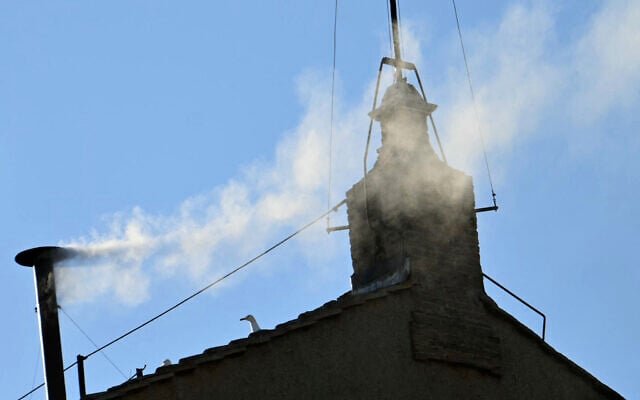 This photograph shows white smoke rising from the chimney of the Sistine Chapel signaling that cardinals elected a new pope during their conclave in the Vatican on May 8, 2025. (Alberto Pizzoli/AFP) This photograph shows white smoke rising from the chimney of the Sistine Chapel signaling that cardinals elected a new pope during their conclave in the Vatican on May 8, 2025. (Alberto Pizzoli/AFP)