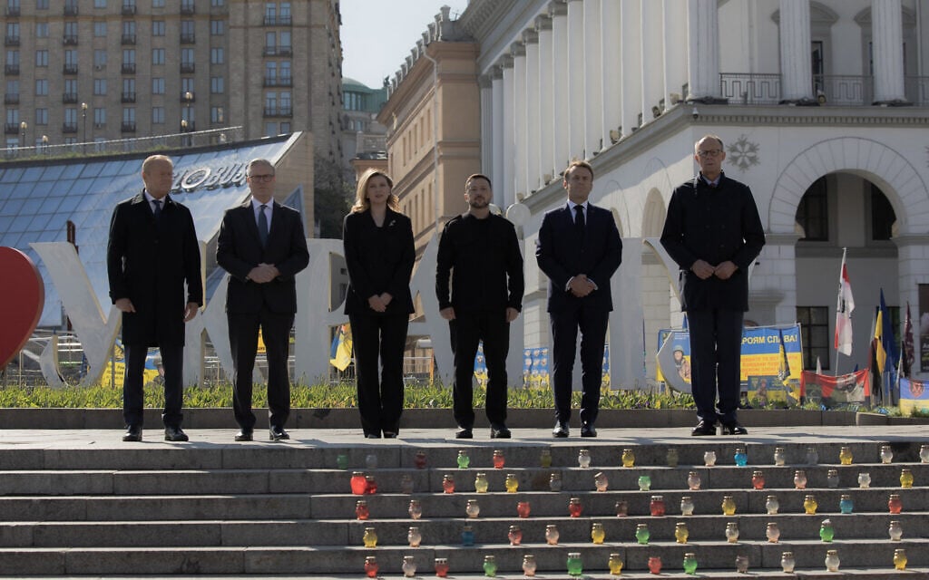 (From L) Poland's Prime Minister Donald Tusk, Britain's Prime Minister Keir Starmer, Olena Zelenska, Ukraine's President Volodymyr Zelensky, France's President Emmanuel Macron and Germany's Chancellor Friedrich Merz pose for a picture at the Independence Square in Kyiv on May 10, 2025. (Roman PILIPEY / AFP)