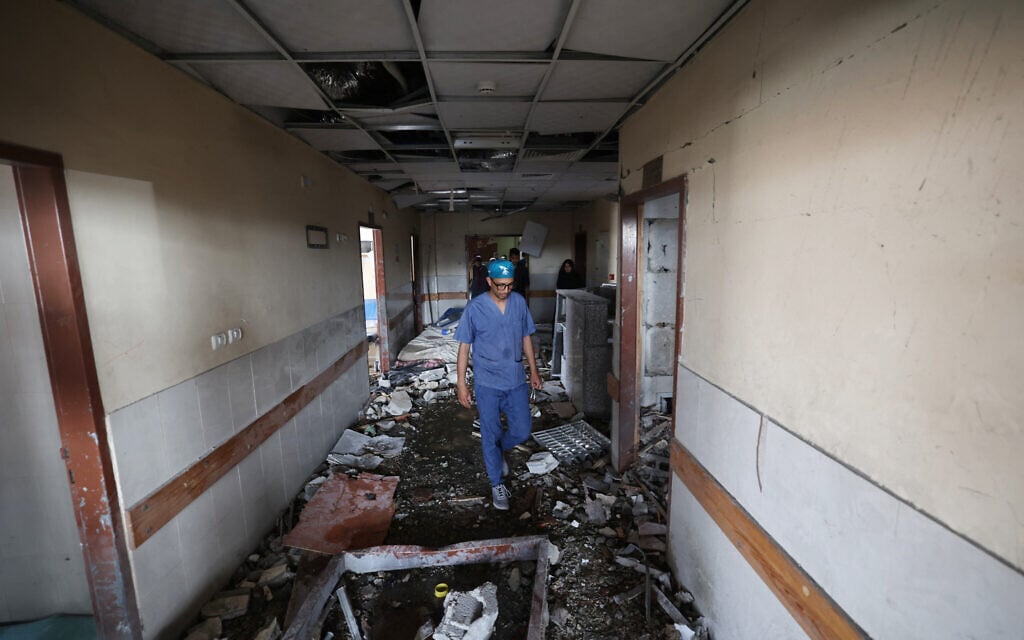 Palestinian hospital staff inspect the destruction inside Nasser hospital in Khan Younis in the southern Gaza Strip, following an Israeli strike early on May 13, 2025. (Eyad BABA / AFP)