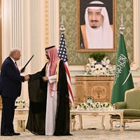 US President Donald Trump, left, shakes hands with Saudi Crown Prince Mohammed bin Salman during a bilateral meeting in Riyadh on May 13, 2025. (Brendan Smialowski / AFP)
