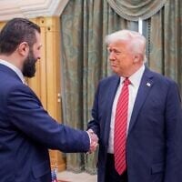 A cropped handout picture provided by the Saudi Royal Palace shows US President Donald Trump (R) shaking hands with Syria's interim president Ahmed al-Sharaa (L) in Riyadh on May 14, 2025. (Bandar AL-JALOUD / Saudi Royal Palace / AFP)