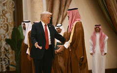 US President Donald Trump (left) speaks with Saudi Crown Prince Mohammed bin Salman during a gathering of the six-nation Gulf Cooperation Council (GCC) in Riyadh on May 14, 2025. (Brendan SMIALOWSKI / AFP)