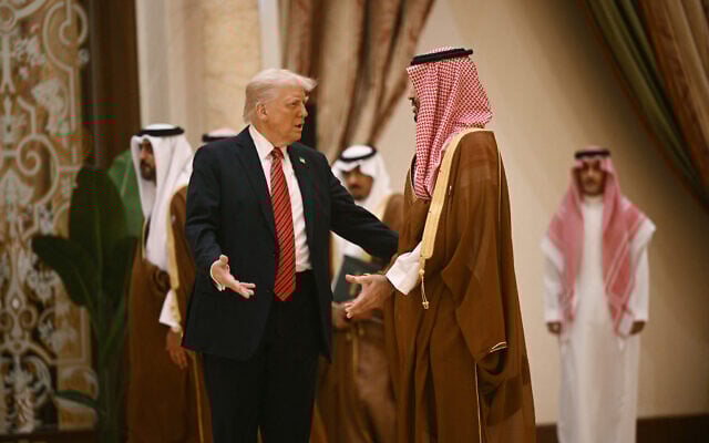 US President Donald Trump (left) speaks with Saudi Crown Prince Mohammed bin Salman during a gathering of the six-nation Gulf Cooperation Council (GCC) in Riyadh on May 14, 2025. (Brendan SMIALOWSKI / AFP)
