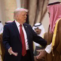 US President Donald Trump speaks with Saudi Crown Prince Mohammed bin Salman before posing for a family picture with Gulf leaders during a gathering of the six-nation Gulf Cooperation Council (GCC) in Riyadh on May 14, 2025. (Brendan Smialowski / AFP)