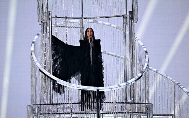 Israeli singer Yuval Raphael with the song 'New Day Will Rise' performs during the second semifinal of the Eurovision Song Contest 2025, at the St. Jakobshalle arena in Basel on May 15, 2025. (Fabrice Coffrini/AFP)