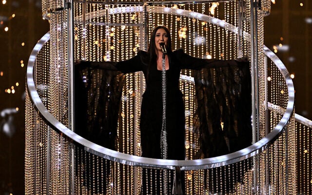 Israeli singer Yuval Raphael performs 'New Day Will Rise' during the second semifinal of the Eurovision Song Contest 2025, at the St. Jakobshalle arena in Basel on May 15, 2025. (Fabrice COFFRINI / AFP) Israeli singer Yuval Raphael performs 'New Day Will Rise' during the second semifinal of the Eurovision Song Contest 2025, at the St. Jakobshalle arena in Basel on May 15, 2025. (Fabrice COFFRINI / AFP)