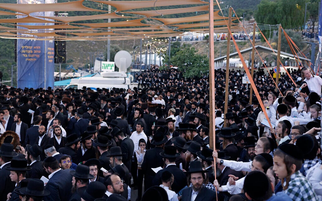 Ultra-Orthodox Jews gather at the gravesite of Rabbi Shimon Bar Yochai at Mount Meron during the Jewish holiday of Lag B'Omer, which marks the anniversary of the death of the Talmudic sage in Meron, northern Israel on May 15, 2025. (Jalaa MAREY / AFP)