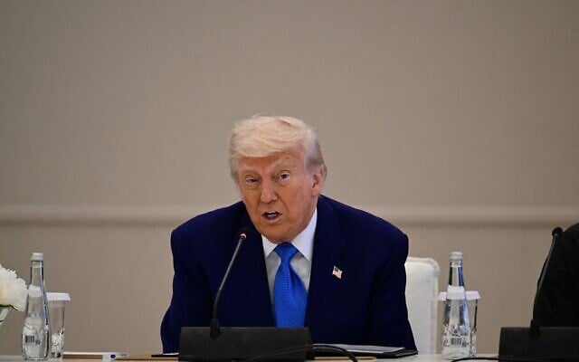 US President Donald Trump attends a business forum at the Ritz Carlton in Abu Dhabi on May 16, 2025 (Giuseppe CACACE / AFP)