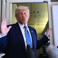 US President Donald Trump speaks to members of the media accompanying him aboard Air Force One, after leaving Abu Dhabi, the United Arab Emirates, at the end of his Middle East tour on May 16, 2025. (Brendan SMIALOWSKI / AFP)