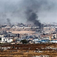 This picture, taken from near the Gaza border in southern Israel, shows smoke billowing over destroyed buildings on the Gaza Strip during reported Israeli bombardment, May 17, 2025. (Jack GUEZ / AFP)