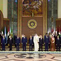 Arab leaders pose for a group photo ahead of the opening session of the 34th Arab League summit in Baghdad on May 17, 2025. (Hadi Mizban / POOL / AFP)