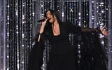 Israel's Yuval Raphael performs 'New Day Will Rise' during the grand final of the Eurovision Song Contest 2025, at the St. Jakobshalle arena in Basel, Switzerland, on May 17, 2025. (Fabrice COFFRINI / AFP)
