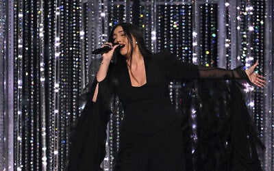 Israel's Yuval Raphael performs 'New Day Will Rise' during the grand final of the Eurovision Song Contest 2025, at the St. Jakobshalle arena in Basel, Switzerland, on May 17, 2025. (Fabrice COFFRINI / AFP)
