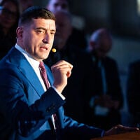 Leader of the far-right Alliance for the Union of Romanians party George Simion speaks to supporters after first exit polls were announced, in the second round of the presidential election in Bucharest, Romania, on May 18, 2025. (Mihai Barbu / AFP)
