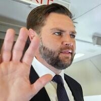 Vice President JD Vance talks to reporters on board of the Air Force Two at Leonardo da Vinci International Airport, in Rome, on May 19, 2025, after attending the inauguration of Pope Leo XIV at the Vatican. (Jacquelyn Martin / POOL / AFP)