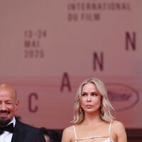 Swedish director Tarik Saleh and his wife Frida Franzen Saleh leave after the screening of the film "Eagles of the Republic" at the 78th edition of the Cannes Film Festival in Cannes, southern France, on May 19, 2025. (Sameer AL-DOUMY / AFP)