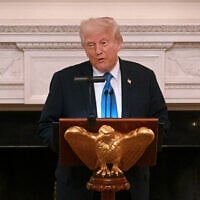 US President Donald Trump speaks during a Kennedy Center Board dinner in the State Dining Room of the White House in Washington, DC, on May 19, 2025. (Jim WATSON / AFP)