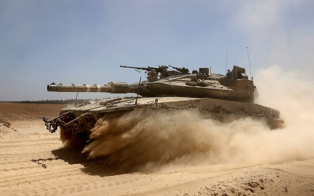 An Israeli tank deploys at Israel's southern border with the Gaza Strip on May 20, 2025 (Photo by Jack GUEZ / AFP)
