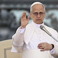 Pope Leo XIV blesses the crowd at the end of his first weekly general audience at St. Peter's Square in The Vatican on May 21, 2025. (Filippo MONTEFORTE / AFP)