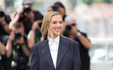 US director Scarlett Johansson during a photocall for the film 'Eleanor the Great' at the 78th edition of the Cannes Film Festival in Cannes, southern France, on May 21, 2025. (Sameer AL-DOUMY / AFP)