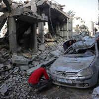 Palestinians check the destruction following Israeli strikes in Jabaliya's Saftawi neighborhood in the northern Gaza Strip on May 22, 2025. (Bashar Taleb/AFP)