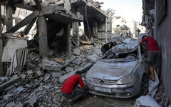 Palestinians check the destruction following Israeli strikes in Jabaliya's Saftawi neighborhood in the northern Gaza Strip on May 22, 2025. (Bashar Taleb/AFP)