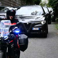 Vehicles of delegations leave the Omani embassy after a fifth round of nuclear talks between Iran and the United States, in Rome on May 23, 2025. (Photo by Filippo MONTEFORTE / AFP)