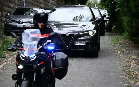 Vehicles of delegations leave the Omani embassy after a fifth round of nuclear talks between Iran and the United States, in Rome on May 23, 2025. (Photo by Filippo MONTEFORTE / AFP)