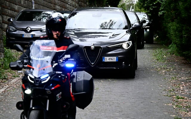 Vehicles of delegations leave the Omani embassy after a fifth round of nuclear talks between Iran and the United States, in Rome on May 23, 2025. (Photo by Filippo MONTEFORTE / AFP)