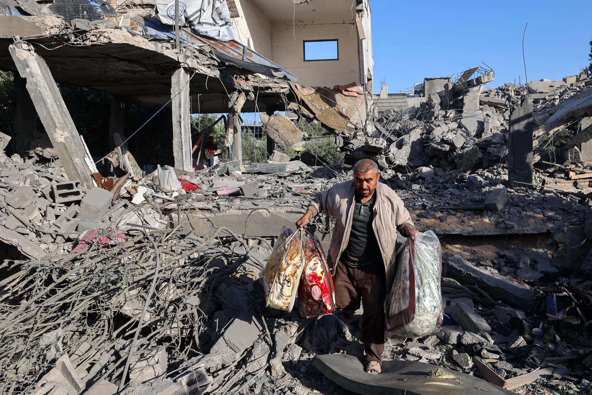 NextImg:IDF kills 6 gunmen guarding trucks amid looting as humanitarian aid trickles into Gaza