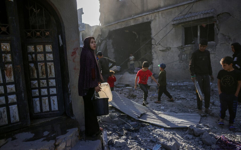 People check the site of an overnight Israeli strike, in Jabaliya in the northern Gaza Strip, on May 30, 2025. (Bashar Taleb/AFP)