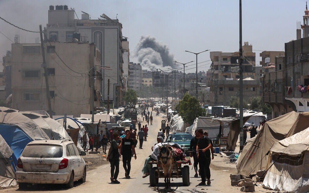 Smoke billows following Israeli strikes on al-Tuffah neighborhood in Gaza City, on May 31, 2025. (Omar AL-QATTAA / AFP) Smoke billows following Israeli strikes on al-Tuffah neighborhood in Gaza City, on May 31, 2025. (Omar AL-QATTAA / AFP)