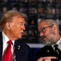 Then-Republican presidential nominee President Donald Trump talks with Rabbi Yehuda Kaploun at an event marking one year since the October 7 Hamas atrocities, October 7, 2024, in Miami. (AP Photo/Alex Brandon)
