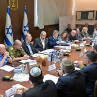 In this photo provided by the Government Press Office, Prime Minister Benjamin Netanyahu, center, convenes his security Cabinet to vote on a ceasefire deal in Jerusalem, Jan. 17, 2025. (Koby Gideon/Israeli Government Press Office via AP, File)