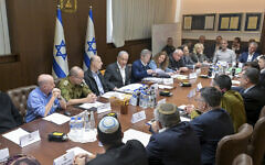 In this photo provided by the Government Press Office, Prime Minister Benjamin Netanyahu, center, convenes his security Cabinet to vote on a ceasefire deal in Jerusalem, Jan. 17, 2025. (Koby Gideon/Israeli Government Press Office via AP, File)