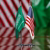 American and Saudi Arabia flags are seen during a meeting of US Secretary of Defense Pete Hegseth and Saudi Defense Minister Prince Khalid bin Salman, at the Pentagon in Washington, February 24, 2025. (Jacquelyn Martin/AP)
