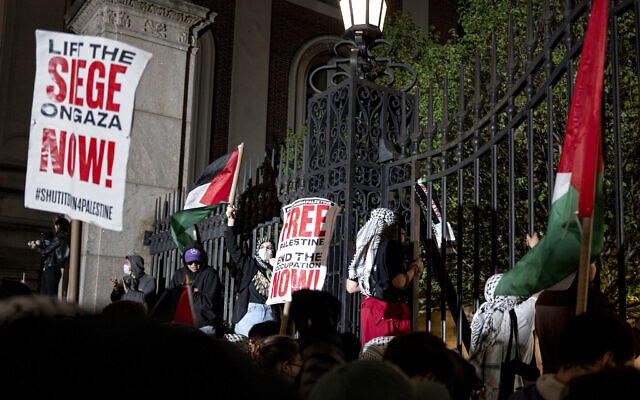 Illustrative: Pro-Palestinian, anti-Israel protesters gather near a main gate at Columbia University in New York, April 30, 2024. (AP Photo/Craig Ruttle, File) Illustrative: Pro-Palestinian, anti-Israel protesters gather near a main gate at Columbia University in New York, April 30, 2024. (AP Photo/Craig Ruttle, File)