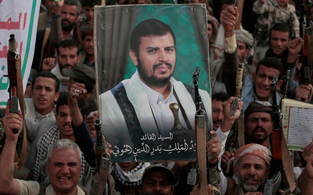 Houthi supporters chant slogans and hold pictures of Abdul Malik al-Houthi, the leader of the Houthi movement, during an anti-US and anti-Israel rally in Sanaa, Yemen, March 17, 2025. (AP Photo/Osamah Abdulrahman)