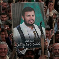 Houthi supporters chant slogans and hold pictures of Abdul Malik al-Houthi, the leader of the Houthi movement, during an anti-US and anti-Israel rally in Sanaa, Yemen, March 17, 2025. (AP Photo/Osamah Abdulrahman)