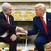 US President Donald Trump, right, shakes the hand of Prime Minister Benjamin Netanyahu in the Oval Office of the White House, April 7, 2025, in Washington. (Pool via AP)