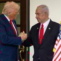 US President Donald Trump, left, shakes hands with Prime Minister Benjamin Netanyahu as he leaves the West Wing of the White House, April 7, 2025, in Washington. (AP Photo/Mark Schiefelbein)